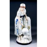 A Royal Dux porcelain figure of a girl collecting water, 23ins high (with applied pad mark and