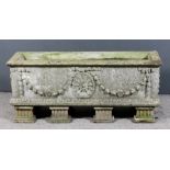 A composition stone rectangular garden trough of "Neo-Classical" design moulded with oval fan,