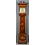 An Edwardian inlaid mahogany longcase clock by Maple & Co. of London, the 11ins square brass dial