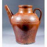 An English 19th Century brown salt-glazed stoneware single spouted pot with ribbed handle, 10.