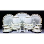 An extensive Wedgwood bone china cream, pale blue and gilt "Cliveden" pattern part dinner service (