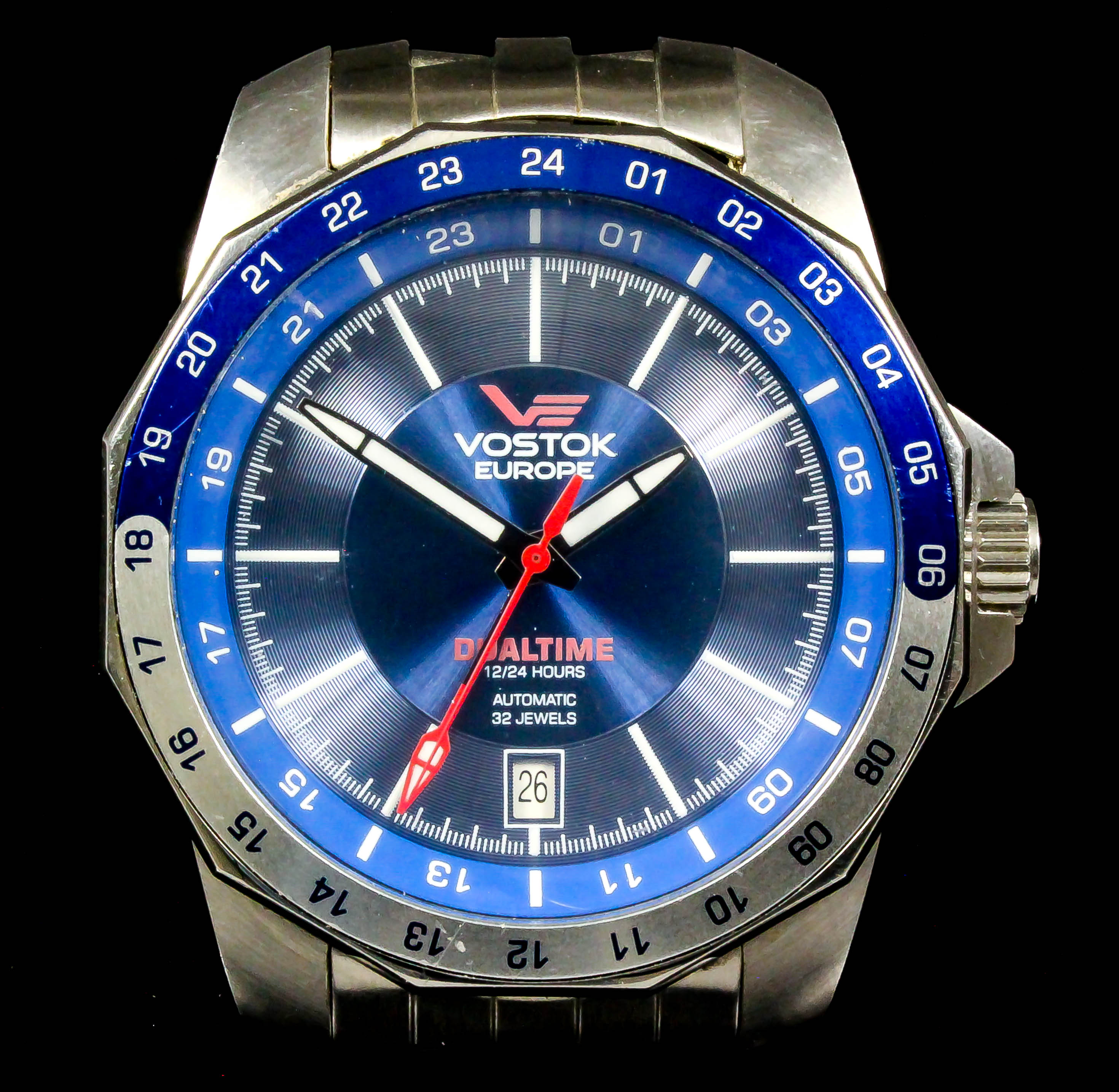 A gentleman's automatic "Dual time" wristwatch by Vostok, the blue face with white baton numerals,