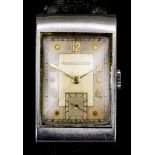 A gentleman's Jaeger LeCoultre stainless steel rectangular cased wristwatch, the gilt dial with