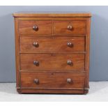 A Victorian mahogany chest with rounded front corners, fitted two short and three long drawers, on