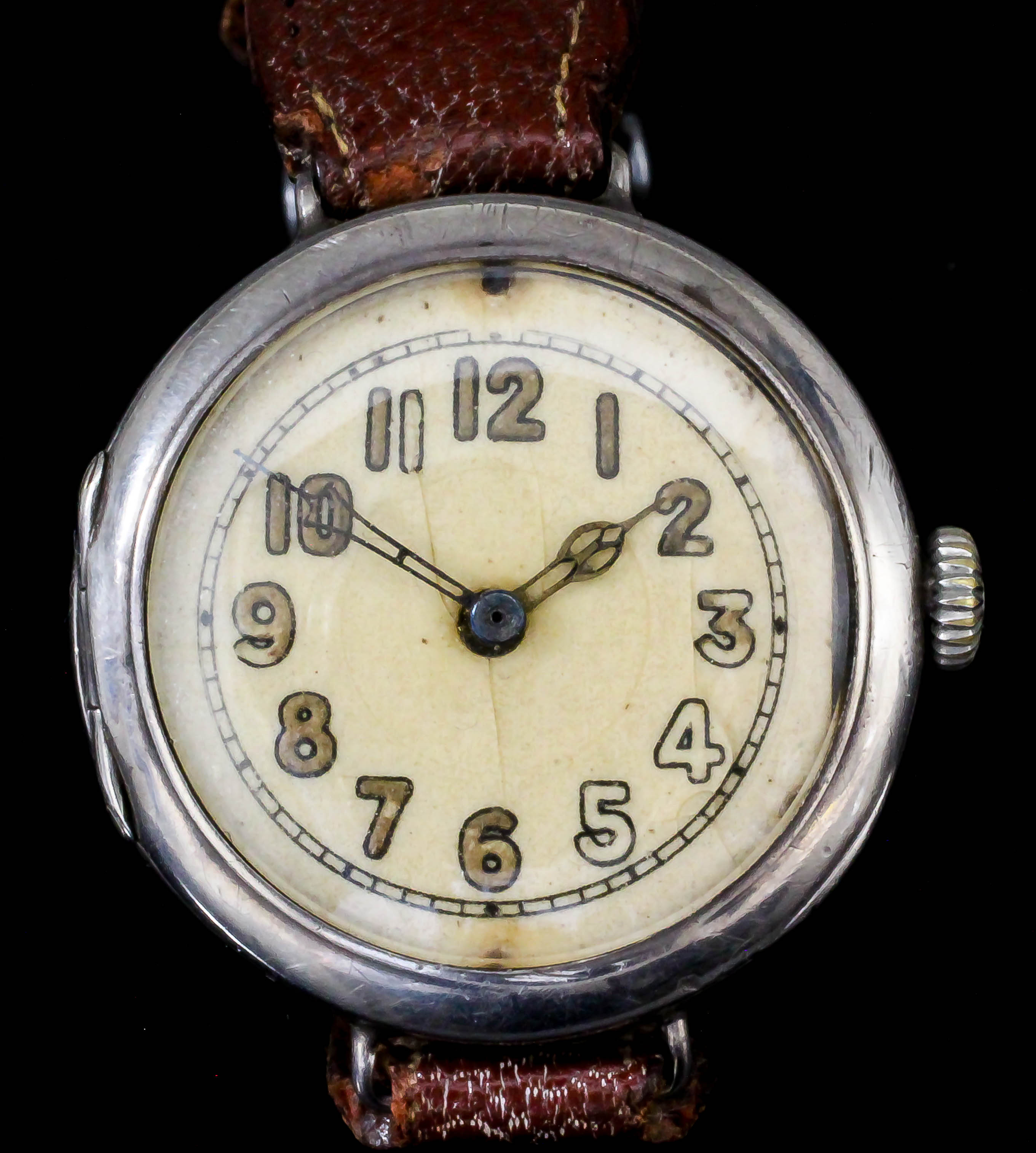 A George V gentleman's silver cased Rolex wristwatch, the cream dial with luminous Arabic