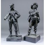 Two late 19th Century bronze figures of cavaliers in 17th Century dress, each on polished slate
