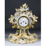 A 19th Century French porcelain cased mantel clock by Henri Marc of Paris, No. 18454, the 2.75ins