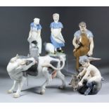 Three Bing & Grondahl porcelain figures - "Blacksmith (2225)", 11.25ins high, milkmaid with pail (