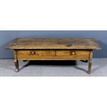 A Continental oak topped low table with two plank cleated top, the oak and pine base fitted two