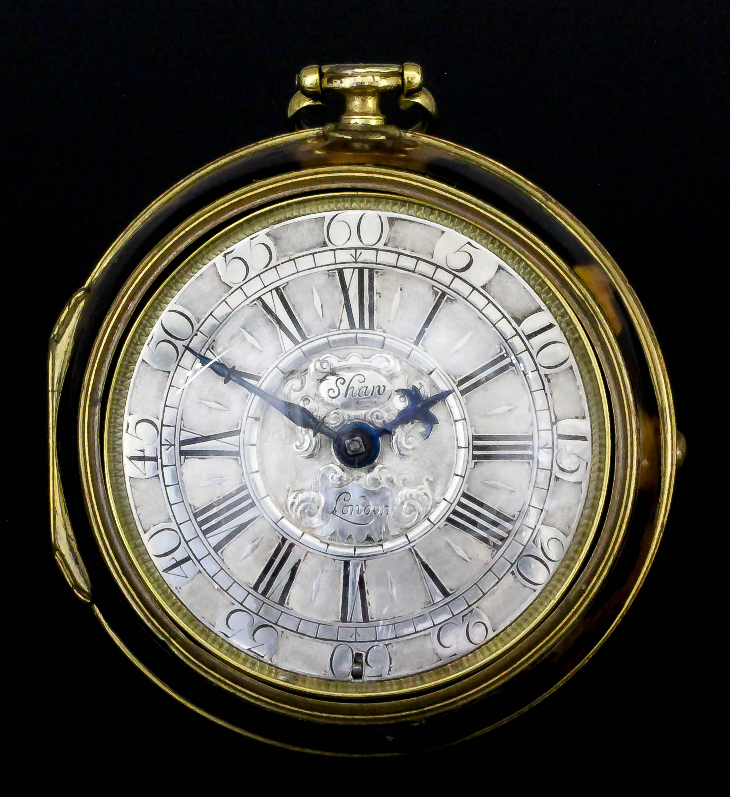 A good early 18th Century gilt metal and tortoise shell pair cased verge pocket watch by John Shaw