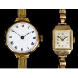 An early 20th Century lady's 9ct gold cased wristwatch, the white enamel dial with Roman numerals,