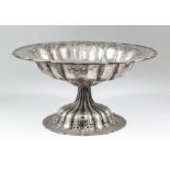 An Austro-Hungarian silvery metal circular tazza of reeded form with shaped and moulded rim and