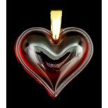 A modern Lalique red moulded glass heart pattern pendant with gold coloured metal suspension loop,