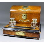 An Edwardian oak stationary and ink stand with two glass inkwells and single drawer, 12ins x 9.25ins