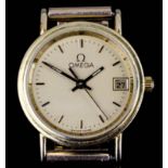 A lady's Omega 18ct gold cased quartz wristwatch, the gold dial with gold baton numerals and date