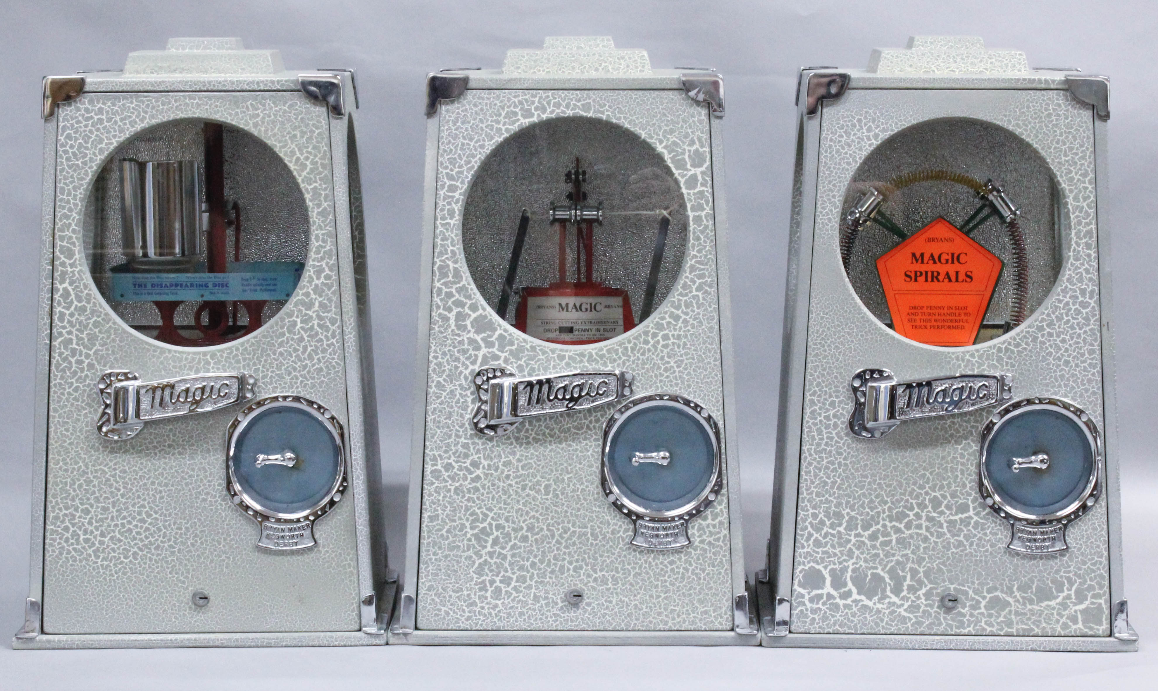 A set of three 1970's Bryans "Penny-in-the-Slot" "Magic" machines - "The Disappearing Disc" Serial