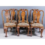 A set of six early 20th Century figured walnut high back dining chairs of "18th Century" design, the