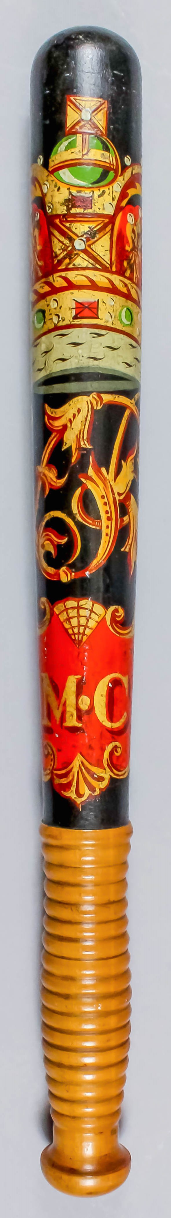 A Victorian turned wood truncheon, painted with crown over "VR", over "M.C." within shaped