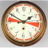 A Sestrel World War II British Navy brass cased bulk head timepiece, the 8ins diameter white dial