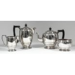 An Edward VIII and George VI silver circular four piece tea service of "Art Deco" design, with