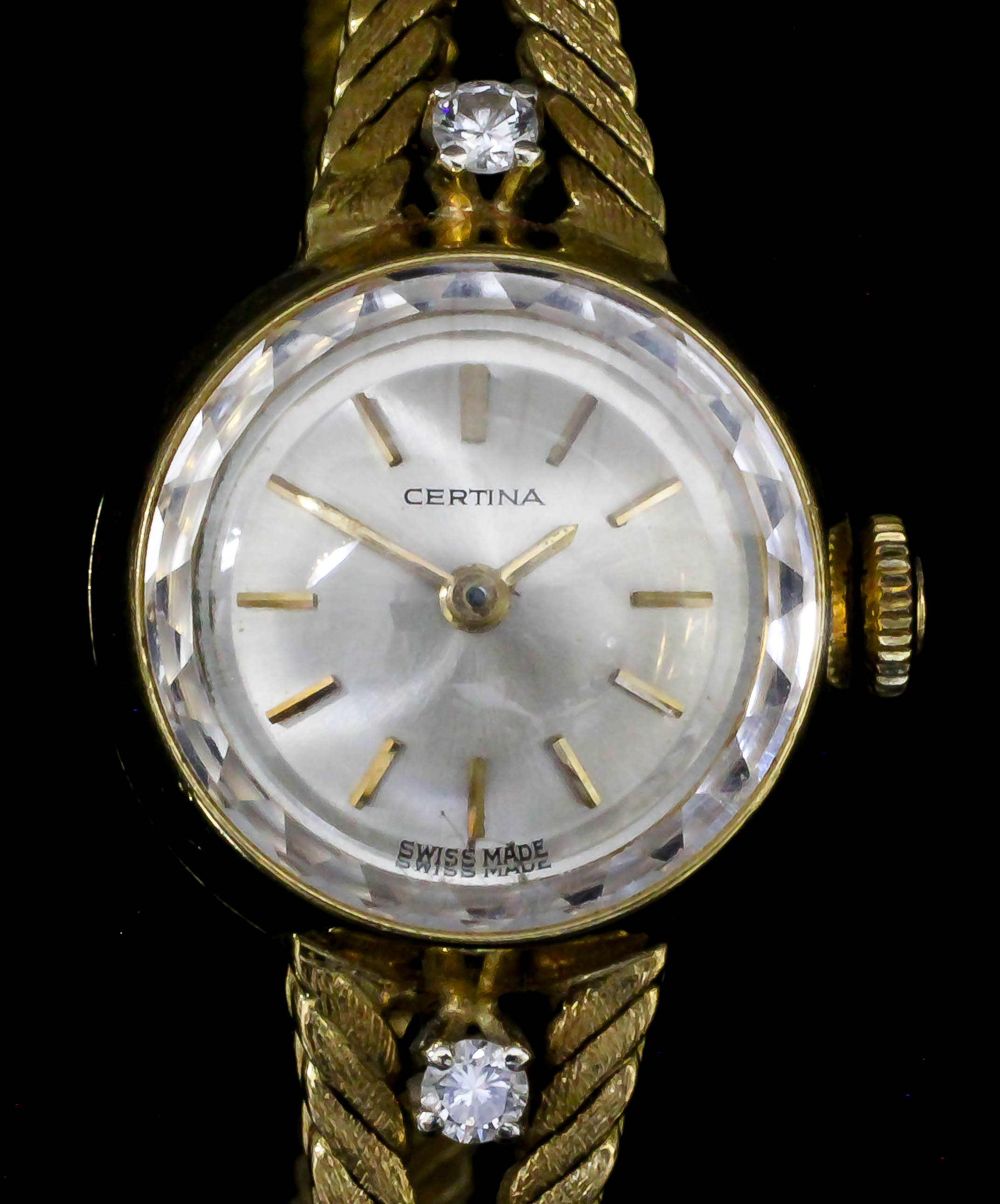 A lady's 18ct gold cocktail watch by Certina, the silver dial with gold hands and batons, 18mm