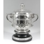 A late Victorian silver two-handled porringer and cover, the domed cover with pierced and cast