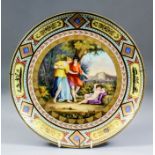 A late 19th Century "Vienna" porcelain cabinet plate, the centre painted in colours with a