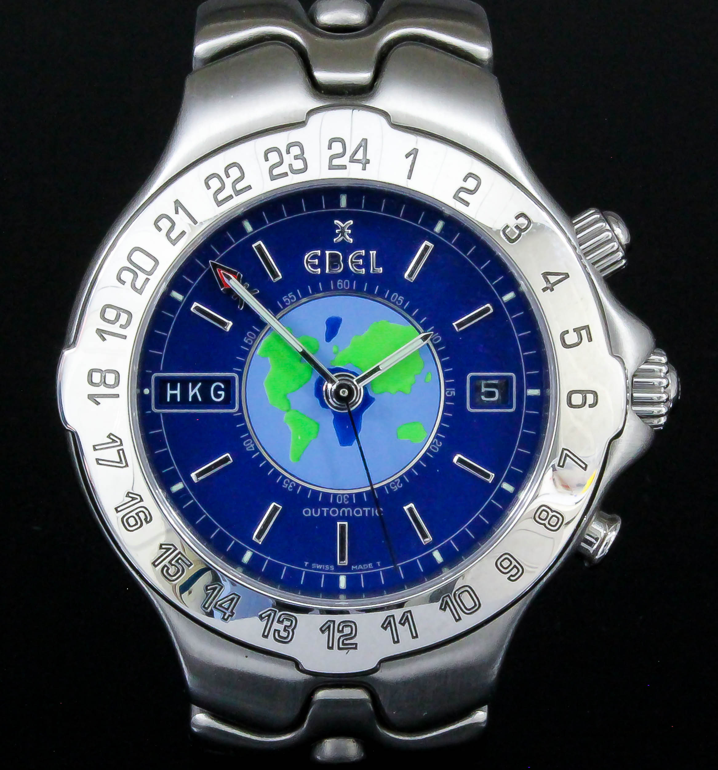 A gentleman's "Sportwave World Time" wristwatch by Ebel, the blue dial with silver baton numerals,