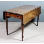 An early 19th Century mahogany Pembroke table with reeded edge to top., fitted one real and one
