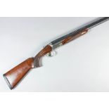 An unusual .410 calibre triple barrel shotgun by Akkar, Serial No. 1643002, the 30ins blued triple