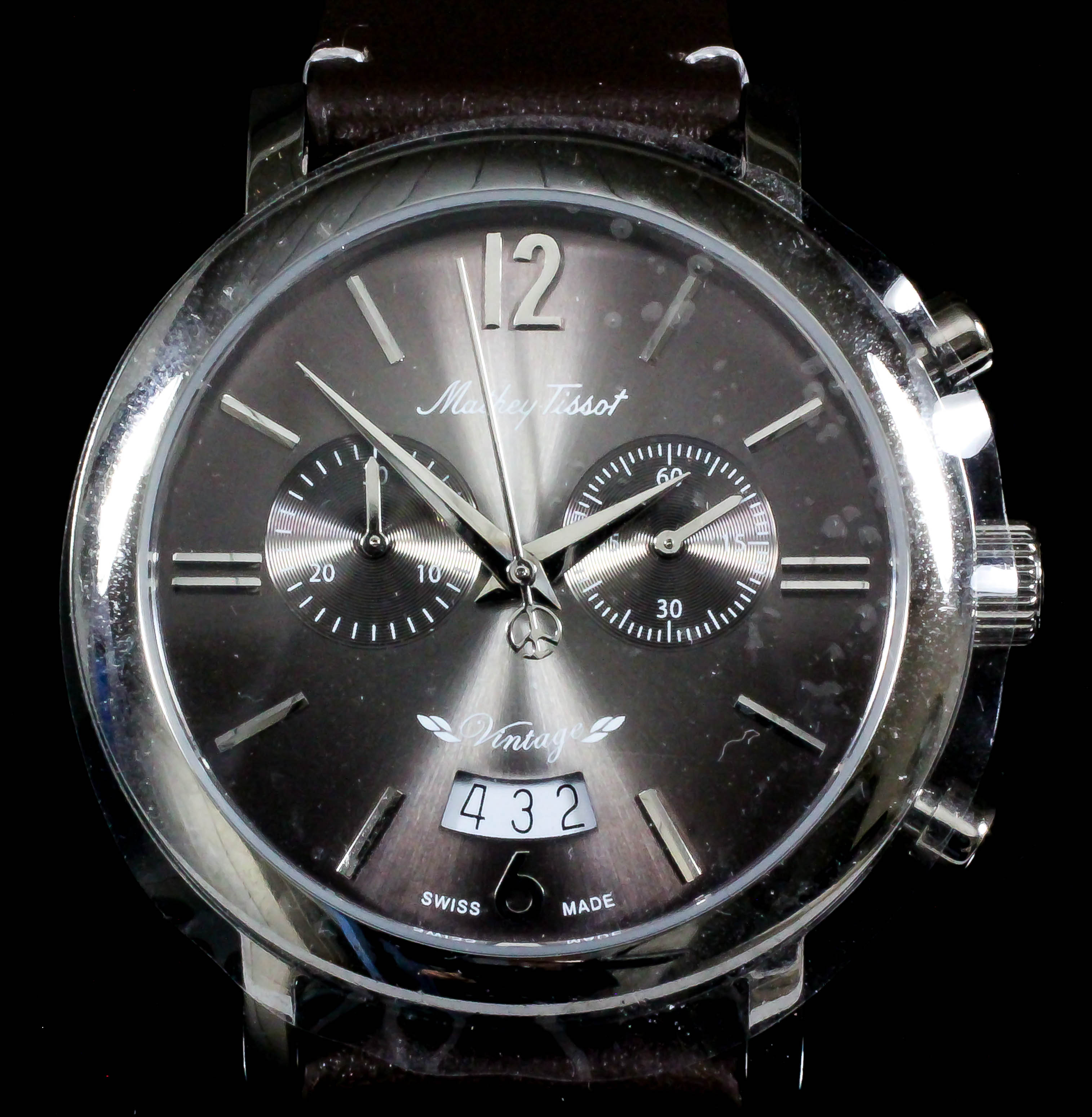 A gentleman's quartz wristwatch by Mathey-Tissot, the grey dial with silver baton numerals, two