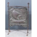 An early 20th Century copper and iron fireguard in Arts and Crafts style, in the manner of John