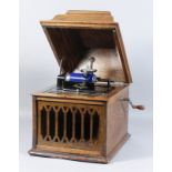 An early 20th Century Edison "Amberola" phonograph, No. 2958, contained in oak rectangular case with