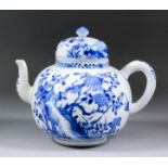 A Chinese blue and white porcelain tea or wine pot and cover, painted with flowering branches