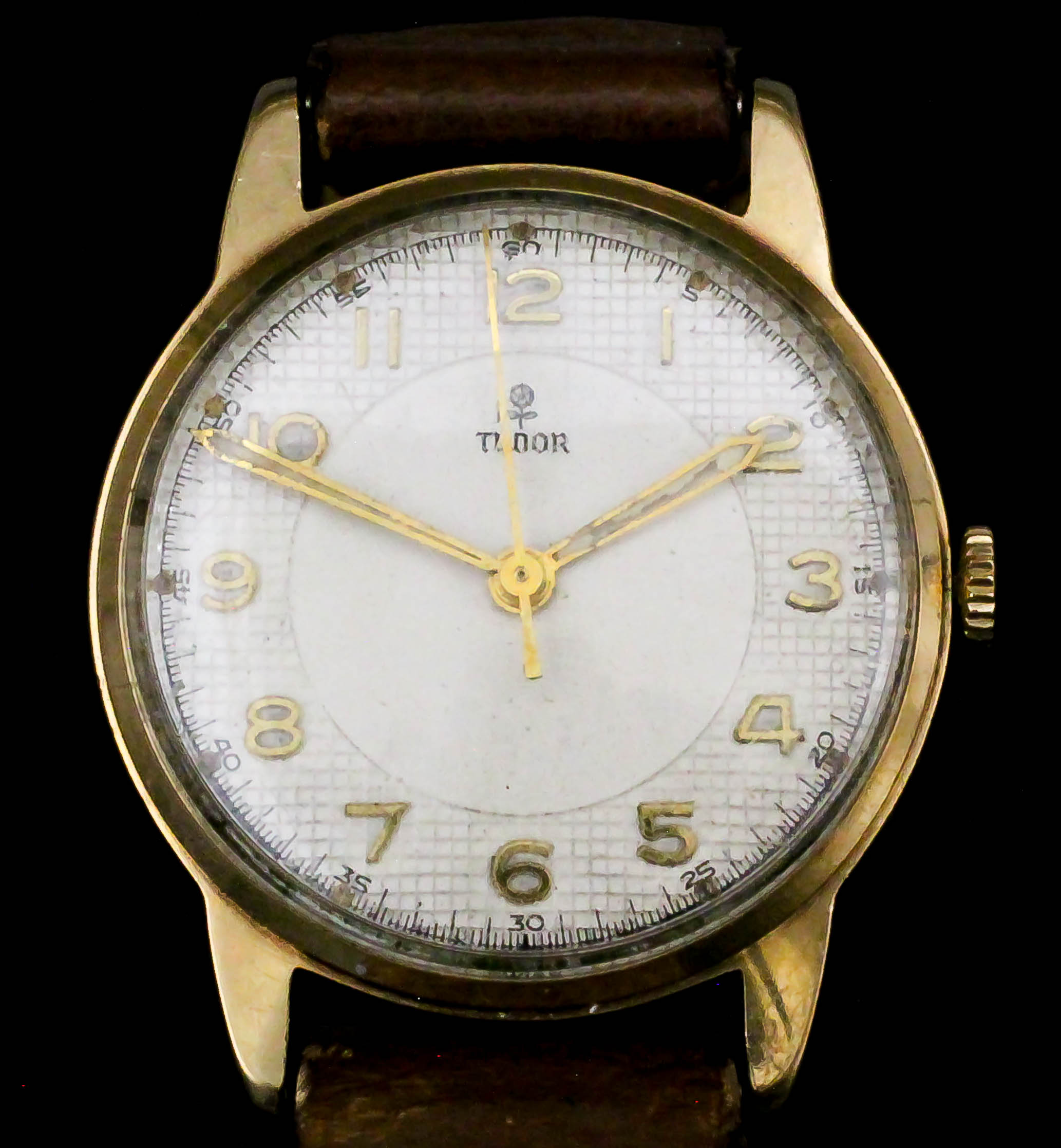 A gentleman's Tudor 9ct gold cased manual wind wristwatch, the cream dial with gold Arabic numerals,