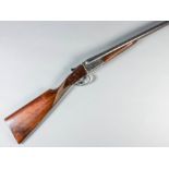 A 12 bore side by side shotgun by A.Y.A. Model No. 4, Serial No. 355810, the 28ins blued steel