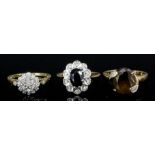 A 14ct gold mounted pave set flowerhead ring (size O), and two other 9ct gold gem set rings (size N)