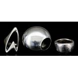 Two modern Scandinavian silver rings designed by Georg Jensen, and another by Jacqueline Rabun (