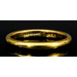 A 22ct gold wedding band (size R - gross weight 4.5 grammes)