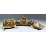 A Secessionist copper and brass desk set, with owl and pine cone details, comprising ink stand, 9.