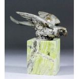 A bronze and silvered car mascot modelled as a parrot, on marble base, 6.5ins high