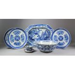 A Chinese blue and white porcelain bowl with shaped rim, painted with flowering sprays within