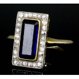 A 19th Century 18ct gold mounted sapphire and diamond ring, the central rectangular sapphire (