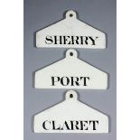 Three 19th Century creamware wine labels with angled tops worded "Port", "Claret" and "Sherry", each