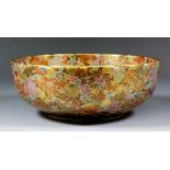A Japanese Satsuma pottery circular bowl finely decorated in colours and gilt with chrysanthemums