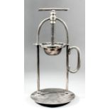 An early 20th Century Mappin & Webb plated citrus press, 13ins high (with "triple deposit mark")