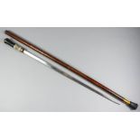 A 20th Century Indian composite walking cane sword stick with hardwood shaft, the 22.75ins blade