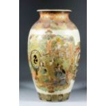 A Japanese Satsuma pottery baluster-shaped vase, enamelled in colours and gilt with figures in a