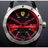 Three gentleman's quartz "Ferrari" designer wristwatches of differing designs, and one gentleman'