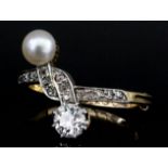 An 18ct gold mounted diamond and pearl "scarf" ring, set with diamond (approximately .25ct),